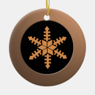 Metallischer Bronzekreis und Pfirsichschneeflocke Keramikornament