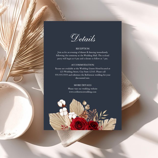Midnight Blue Bourgogne Rose Détails Carte (Midnight Blue Burgundy Roses Wedding Details Card on a boho table with dry palm leaf.)