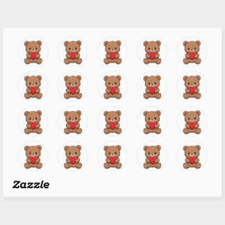 Mignon ours en peluche tenant un autocollant coeur