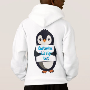 Mignon pingouin tenant un panneau pour un texte pe