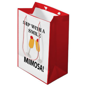 Mimosa Sip mit einem lächelnden Mimosa Mittlere Geschenktüte