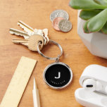 Minimal Black Classic Monogram Round Schlüsselanhänger<br><div class="desc">Minimal monogrammed round keychain feature a black background with your initials and name in white typography for a simple classic professional look.</div>