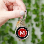 Minimal Classic Monogram Black Red Schlüsselanhänger<br><div class="desc">Minimal monogrammed round keychain features a black background with your monogram initial in red emblem in white classic block typography for a simple classic professional look.</div>
