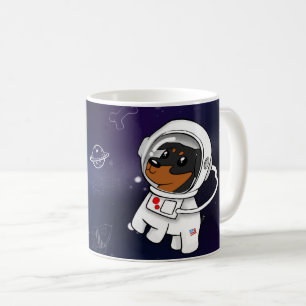 Minimaler Button-Astronaut in der Kaffeetasse