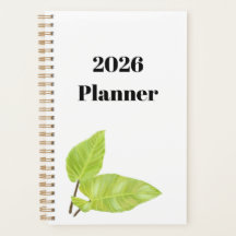 Minimaler weißer Planer mit grün gestrichenen Blät