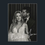 Minimalist Elegant Wedding Photo Custom Thank You Postkarte<br><div class="desc">This modern wedding thank-you postcard features your favorite photo with elegant handwritten script and space on the back to customize a message for your guests. A budget-friendly way to express your gratitude with style. Perfect for couples who love a minimalist,  personal touch.</div>