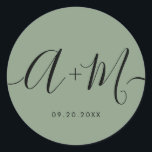 Minimalist Monogram Script Custom green Wedding Runder Aufkleber<br><div class="desc">Elevate your wedding details with the Minimalist Monogram Script Custom Wedding Date green Sticker. This elegant and personalized sticker adds a touch of sophistication to your wedding stationery, allowing you to showcase your monogram and wedding date in a simple yet impactful way. The sticker features a minimalist script design that...</div>