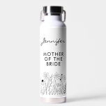 Minimalist Wildflower Mother of the Bride Trinkflasche<br><div class="desc">Celebrate her special role with understated elegance. This minimalist wildflower water bottle features a delicate floral illustration paired with modern typography that proudly reads Mother of the Bride. Perfect for wedding day prep, bridal showers, or as a thoughtful keepsake, this reusable bottle keeps drinks cold or hot for hours. Lightweight,...</div>