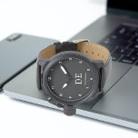 Minimalistisch Moderne Schwarz-Weiß-Monogramm Armbanduhr<br><div class="desc">Dieses moderne Design zeichnet sich durch typografische Initialen und Namen für ein minimalistisches Gefühl aus,  das leicht personalisiert werden kann.</div>