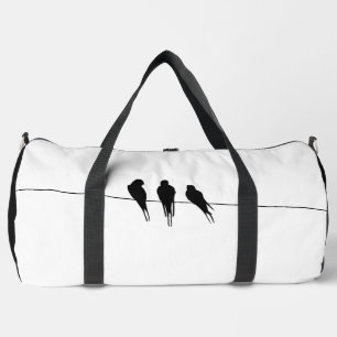 Minimalistische Silhouette von Amseln auf Draht Duffle Bag