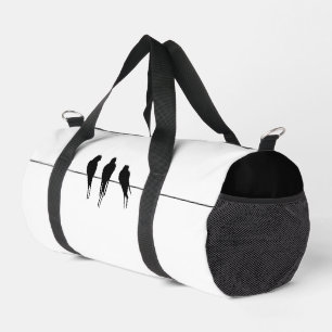 Minimalistische Silhouette von Amseln auf Draht Duffle Bag