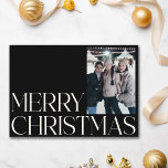 Minimalistische Vintage Eleganto Schwarz 2 Foto We Feiertagskarte<br><div class="desc">Feiern Sie die Saison mit zeitlosem Stil mit dieser Minimalistischen Vintagen Elegant Black 2 Foto Weihnachtskarte. Der schlichte schwarze Hintergrund Set die Bühne für zwei Ihrer Lieblings-Fotos, gerahmt in einem schlichten, aber raffinierten Design. Ideal für diejenigen, die Vintage Eleganz mit einer modernen Drehung schätzen, bietet diese Karte eine elegante Möglichkeit,...</div>