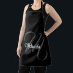 Minimalistischer moderner Monogramm-Anfangsname Schürze<br><div class="desc">Minimalistische moderne Monogramm Anfangsname Schwarz-weiß. Personalisierbarer individuelle Name mit einem kursiven Initial hinter einer schwarzen Farbe.</div>