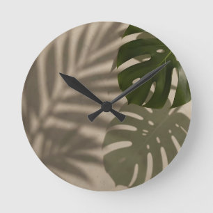 Minimalistisches grünes Monstera-Blatt Tropischer Runde Wanduhr