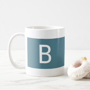 Minimalistisches, modernes türkises und weißes Mon Kaffeetasse