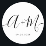 Minimalistisches Mongram Script für das benutzerde Runder Aufkleber<br><div class="desc">Erhöhen Sie Ihre Hochzeitdetails mit dem Minimalistischen Monogram Script Custom Wedding Date Sticker. Dieser elegante und personalisierte Aufkleber fügt Ihrem Hochzeitsgeschenk eine Touch von Eleganz hinzu, sodass Sie Ihr Mono- und Hochzeitsdatum auf einfache, aber wirkungsvolle Weise präsentieren können. Der Aufkleber zeichnet sich durch ein minimalistisches Skriptdesign aus, das zeitlose Eleganz...</div>
