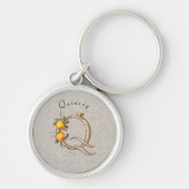 Minimalistisches Monogramm Q: geräuschlose Blume u Schlüsselanhänger