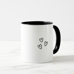 Minimalistisches schwarzes florales Anfangsbuchsta Tasse