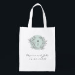 Mint Rustic Monogram Wreath Wedding Danke Bag Wiederverwendbare Einkaufstasche<br><div class="desc">Ideal für eine rustikale Scheunenhochzeit mit moderner Drehung,  ist diese wiederverwendbare Einkaufstasche der ideale Weg,  um sich bei den Gästen aus der Stadt für Ihre Hochzeitsfeier zu bedanken. Ein von Hand gezeichnet Kranz von Ästen und das Monogramm des Paares mit moderner und eleganter Typografie kann völlig personalisiert sein.</div>