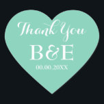 Minzherzförmige Gastgeschenk Hochzeit dank Aufkleb Herz-Aufkleber<br><div class="desc">Minze herzförmige Gastgeschenk Hochzeit danke Ihnen Aufkleber. Minze grüne und weiße oder benutzerdefinierte Hintergrundfarbe. Elegante Skripttypografie. Verwenden Sie als romantische Umschlag Aufkleber / Dichtungen oder als mit Monogramm Gastgeschenk Hochzeit Label für Dankeschön. Niedliche Liebe Symbolform mit stylischem Text. Auch praktisch für andere Anlässe wie z.B. Verlobungsfeier,  Jubiläum etc.</div>