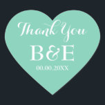 Minzherzförmige Gastgeschenk Hochzeit dank Aufkleb Herz-Aufkleber<br><div class="desc">Minze herzförmige Gastgeschenk Hochzeit danke Ihnen Aufkleber. Minze grüne und weiße oder benutzerdefinierte Hintergrundfarbe. Elegante Skripttypografie. Verwenden Sie als romantische Umschlag Aufkleber / Dichtungen oder als mit Monogramm Gastgeschenk Hochzeit Label für Dankeschön. Niedliche Liebe Symbolform mit stylischem Text. Auch praktisch für andere Anlässe wie z.B. Verlobungsfeier,  Jubiläum etc.</div>