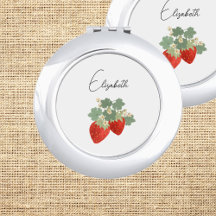 Deux fraises rouges avec feuilles et fleurs | Frui