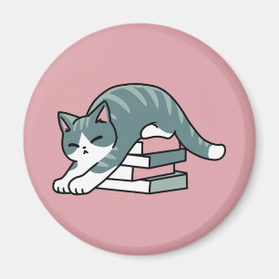 Mit einem Buch und einer Katze aufgerollt - Gemütl Magnet
