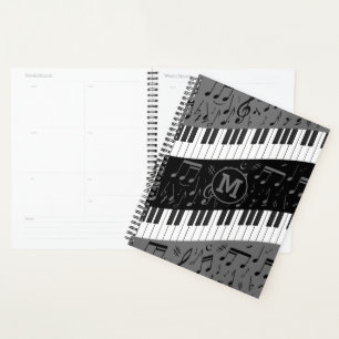 mit Monogramm Kurven-Klaviertasten und musikalisch Planer