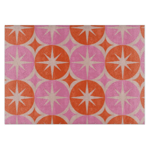 Mitte des Jahrhunderts Starbursts auf rosa und ora Schneidebrett