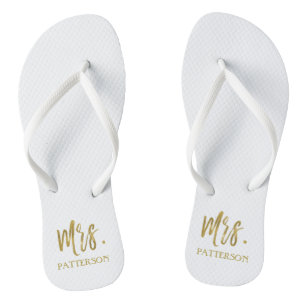 Mme. Le nom des tongs avec de l'huile d'or