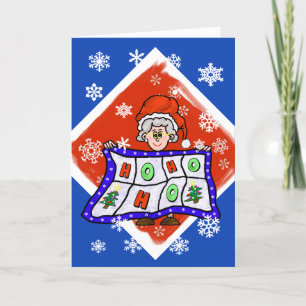 Mme Père Noël avec la carte de voeux de Noël