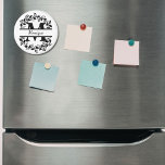 Modern Black Floral Wreath Split Monogram "M" Magnet<br><div class="desc">This refined floral split monogram wreath design features a delicate botanical arrangement forming a graceful circular frame around a customizable monogram "M". The balanced composition highlights elegant leaves and floral accents that create a timeless and sophisticated look. This magnet is perfect for personalized gifts, wedding favors, home accessories, this design...</div>