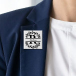 Modern Black Floral Wreath Split Monogram "R" Button<br><div class="desc">This refined floral split monogram wreath design features a delicate botanical arrangement forming a graceful circular frame around a customizable monogram "R". The balanced composition highlights elegant leaves and floral accents that create a timeless and sophisticated look. Perfect for personalized gifts, and accessories, this design blends classic monogram style with...</div>