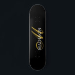 Modern Black Monogram Gold Script Name Skateboard<br><div class="desc">Eine elegante,  goldweiße Monografie auf einem schwarzen Skateboard für Ihren Outdoor-Spaß. Stilvoll und modern.</div>
