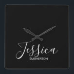 Modern Black White Full Name Elegant Minimal Quadratische Wanduhr<br><div class="desc">Modern, minimalist, and elegant custom wall clock with your first and last names in white script on a black background. This clock will make the perfect addition to your office decor.</div>