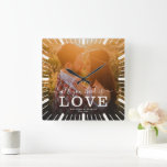 Modern Chic Wedding All you need is Love Photo Quadratische Wanduhr<br><div class="desc">Chic photo throw pillow with script calligraphy and modern typography reading:' All you need is Love 'alongside your custom names. Personalize with your favorite photo,  names,  and wedding date. Great gift for Valentine's Day,  newlyweds,  or an anniversary.</div>