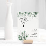 Modern Greenery White Wedding Tischnummer Card<br><div class="desc">Dieses moderne, weiße Hochzeitskartenteam zeichnet sich durch eine einfache Mischung und eine perfekte Abstimmung der Schwarz-Weiß-Stile aus. Die zarten Grünelemente sorgen für einen anmutigen blühte rund um eine einfache, raffinierte Typografie und eine liebliche Kalligraphie. Die Aquarelltöne und andere botanische Blätter gehen wunderschön durcheinander, mit dunklem Smaragd verblasst in einem ombre-Effekt,...</div>