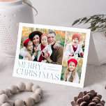 Modern Merry Christmas 4 Photo Collage Feiertagskarte<br><div class="desc">Simple and elegant holiday card featuring a 3 photo collage on the front with "Merry Christmas" displayed in frosted blue modern lettering. Personalize the front of the card by adding your photos and name. The inside of the card features space for your typed or handwritten personal message. The back of...</div>