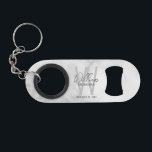 Modern Personalized Groomsman's Monogram and Name Mini Flaschenöffner<br><div class="desc">Modern Personalized Groomsman's Monogram and Name Gifts This design features personalized groomsman's name in grey modern handwriting script font style and monogram in light grey modern sans serif font style as background, with wedding details in grey modern sans serif font style, on white marble background. Also perfect for best man...</div>
