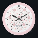 Modern Pink Black Geometric Triangle Pattern Große Wanduhr<br><div class="desc">Modern minimalist wall clock with a geometric triangle pattern in soft pink, black and white tones. The clean design features bold black numbers and hands framed by a delicate pink and white circular border. The word “Geometry” adds a stylish contemporary touch, making this clock perfect for modern interiors, Scandinavian decor,...</div>