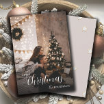 Modern Trendy Christmas Couple Photo Feiertagskarte<br><div class="desc">A trendy urban modern holiday photo flat greeting card with a couple's photo and name with a simple minimal background with string lights and holiday tree. Smoky neutral colors. This phot is a placeholder that must be replaced with your own creative holiday photo.</div>