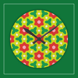 Moderne Blume zu grün und rot geometrisch gegliede Runde Wanduhr