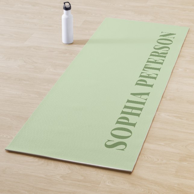 Moderne, feine Typografie zeigt grüne Gewohnheit Yogamatte (Beispiel)