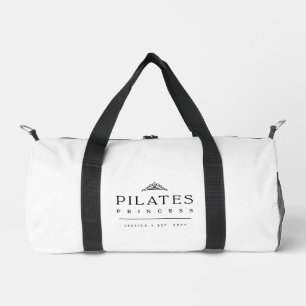 Moderne feminine Pilates Prinzessin in Schwarz und Duffle Bag