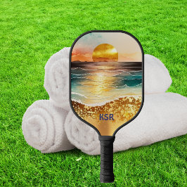 Moderne goldene Sonnenuntergänge über der Ozeanobe Pickleball Schläger