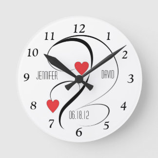 Moderne Herzen und Wirbel, die eine maßgeschneider Runde Wanduhr