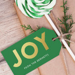 Moderne Imitate Foil Joame Name Christmas Geschenkanhänger<br><div class="desc">Machen Sie eine kühne Aussage in dieser Urlaubssaison mit diesen modernen,  farbenfrohen Geschenketiketten,  mit einfachen Typografie,  die JOY in Imitaten goldenen Folie liest. Die Hintergrundfarbe (in hellgrün dargestellt) kann auf Wunsch angepasst werden. Die Rückseite enthält ein passendes Muster von Imitaten goldenen Weihnachtsbäumen.</div>