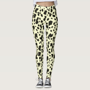 Moderne Kuh-Tierdruck-Muster auf Pastellgelb Leggings