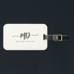 Moderne Monogram Brush Script Black Ivory Stilvoll Gepäckanhänger<br><div class="desc">Dieses elegante und stilvolle monogramm Gepäckanhänger in Elfenbein und Schwarz ist ein raffiniertes minimalistisches Design,  das Ihr Monogramm in einem Pinselskript mit Schnörkeln entlang eleganter Serifentypografie kombiniert.</div>