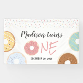 Moderne Pastelnüsse und Sprinklen zum ersten Gebur Banner